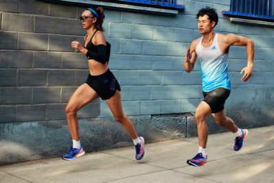 man and woman running