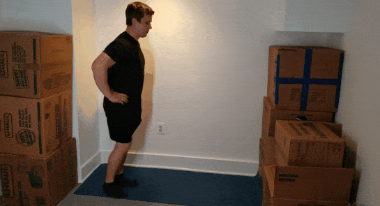 A gif of Coach Jim doing a lunge in a small space.