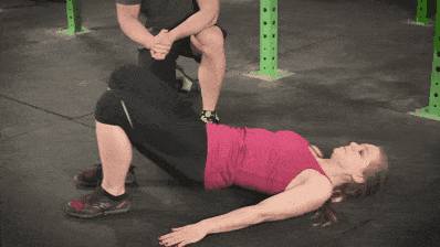 Raising your hips of the floor, like so, is how you do the bridge bodyweight exercise. 