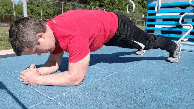 This gif shows Coach Jim doing a front plank