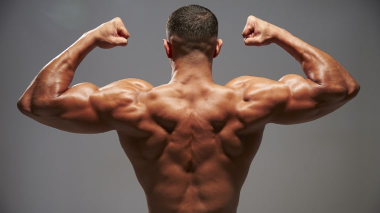 muscular person flexing back and arms
