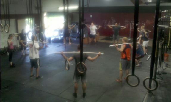These people are in the middle of their workout for CrossFit.