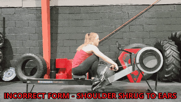 Coach Staci demonstrates incorrect form with shoulders shrugged