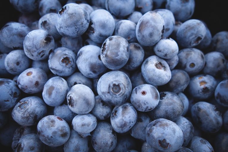 A cup of blueberries (about a fist) is about 85 calories.
