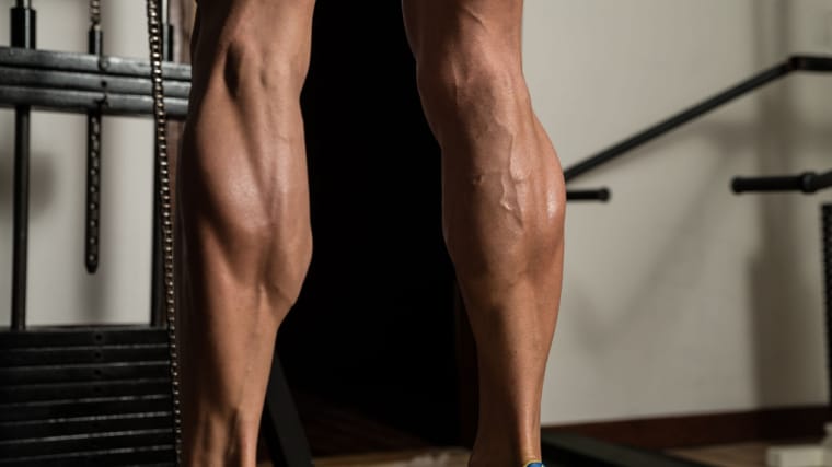 muscular calves doing raises