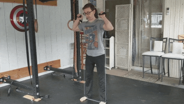A resistance band is a great way to increase the difficulty of squats.