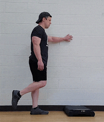 Coach Jim doing a standing one-leg calf raise
